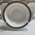 These are authentic mid-century vintage pieces. The style features a distinctive dark/black band paired with detailed gold...