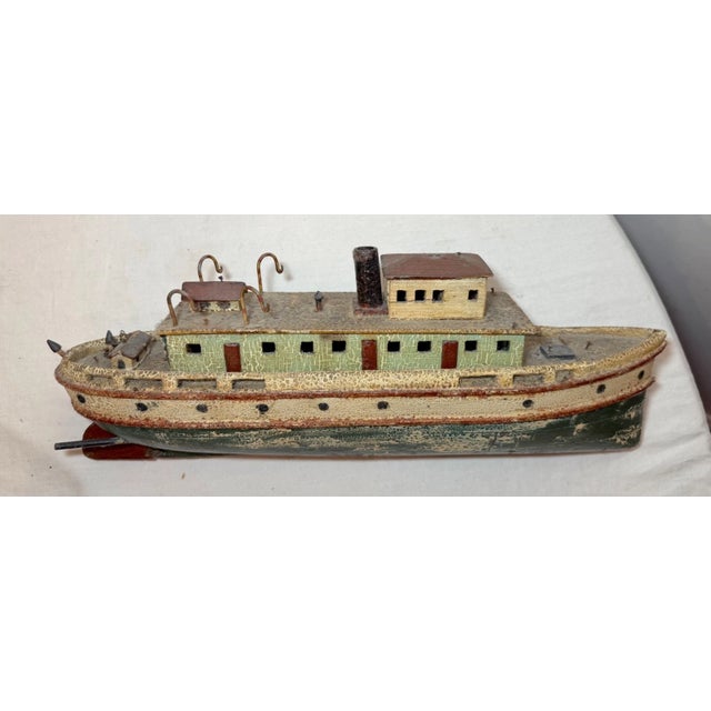 This rare antique handmade wooden Folk Art boat model is a unique and detailed sculpture that showcases exquisite...