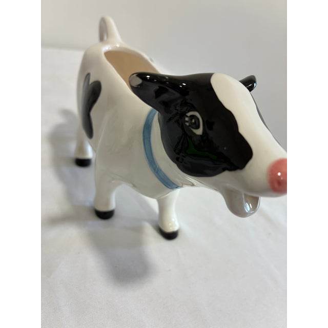 Black Vintage Ceramic Cow Creamer With Blue Bow For Sale - Image 8 of 9