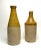 A pair of late 19th to early 20th century antique ale bottles. From research, it is mentioned these vessels were perhaps...