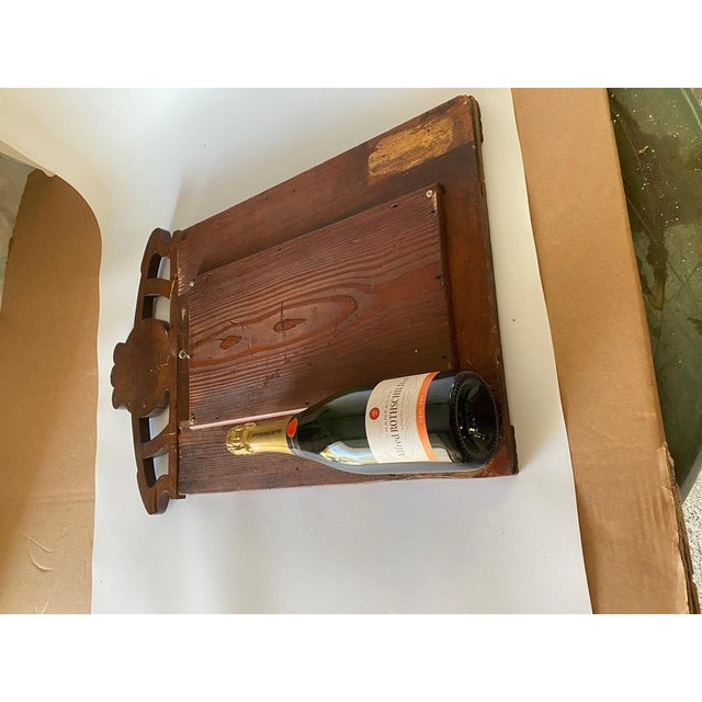 This mirror in is wood, in a brown color. It is Art nouveau Style and Period. It has been made in Autria circa 1900.