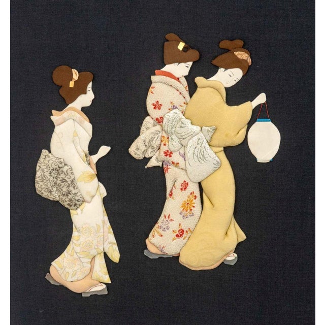 Japanese Figural Group Padded Silk Oshi-e Collage, clear acrylic shadowbox frame. Overall: 26.5" H x 49.5" W x 2" D....