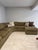 Vintage 1970’s low-profile modular sectional sofa. It’s has olive green textured upholstery and consists of multiple...