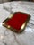 Elegant vintage brass gallery tray featuring a sleek rectangular form with raised brass sides and distinctive folded-...