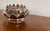 Bring sculptural elegance to your tabletop with this vintage set of nesting lotus bowls by renowned American silversmith...