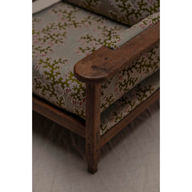 Beautiful early 20th century easy chair from the Arts & Crafts period, featuring a solid oak frame with a strong...