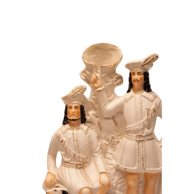 A large scale English Staffordshire of two gentlemen, with a spaniel titled Robin Hood, circa 1860.