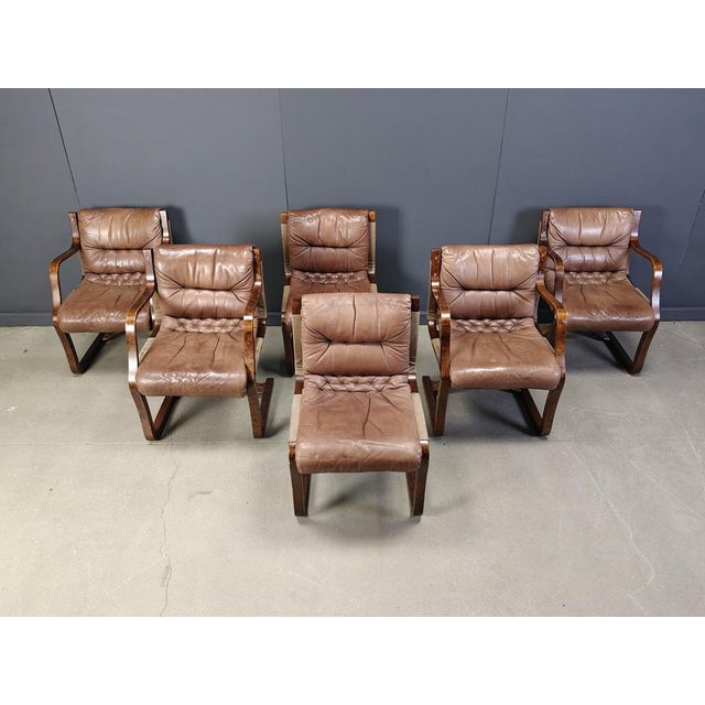 Scandinavian dining chairs by Asko Pajamies Finland made from cantilevered plywood and canvas frames and beautiful leather...