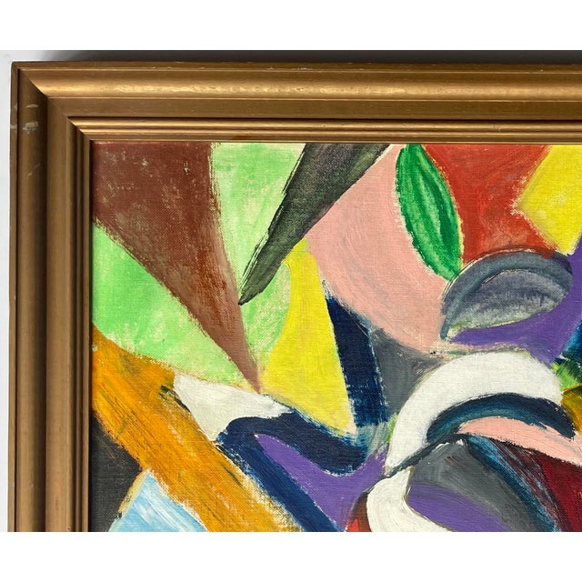 This is a beautifully colored abstract acrylic on canvas, framed in matte-gold. Signed on the lower right.