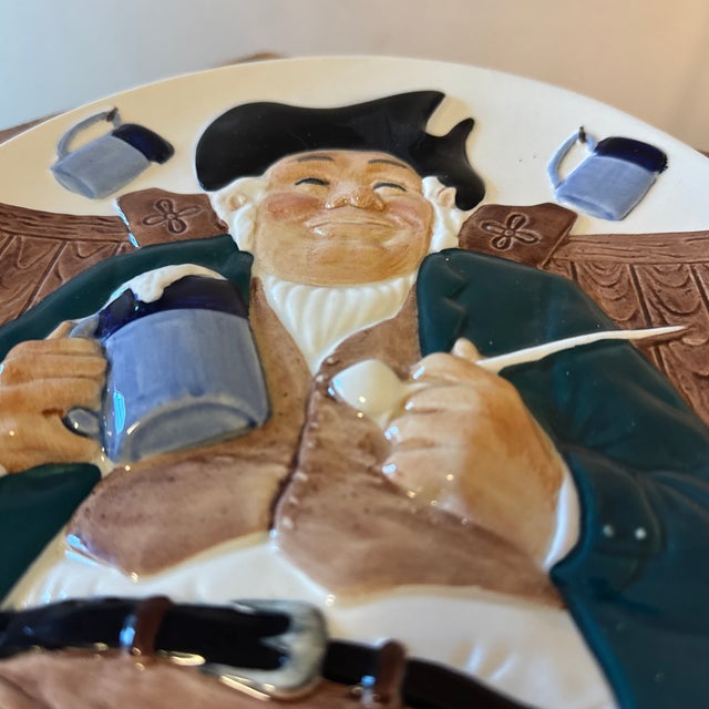 Add timeless character to your space with this Man With Pipe Decorative Plate. Featuring a detailed portrait of a...