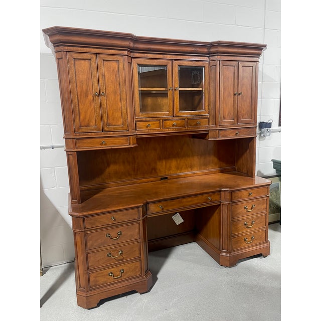A wonderful mahogany office credenza/work station by Sligh Furniture. This unit is composed of two pieces; the top unit...