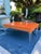 Mid-Century Modern Style High-Gloss Orange Lacquered Wood and Lucite Greek Key Coffee Table by Julio Jimenez For Sale In Miami - Image 6 of 17
