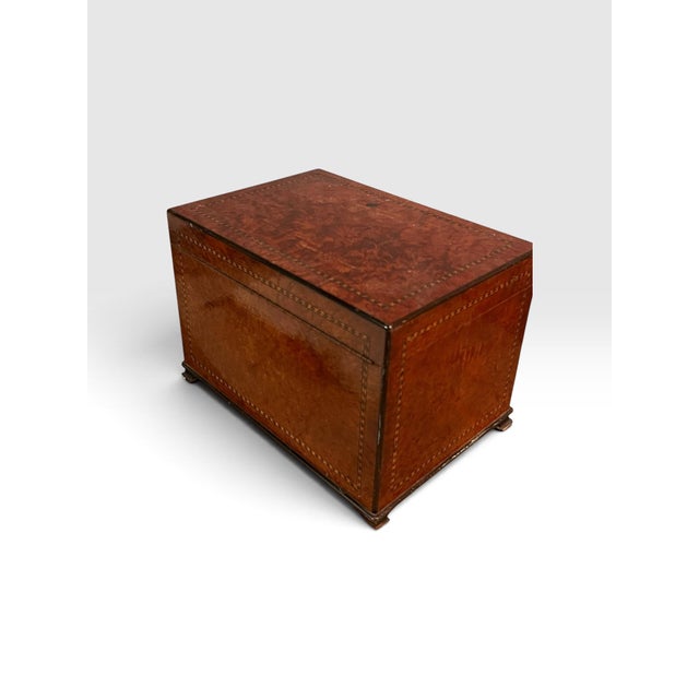 A handsome vintage Alfred Dunhill of London cigar humidor, beautifully constructed in richly figured burlwood with fine...