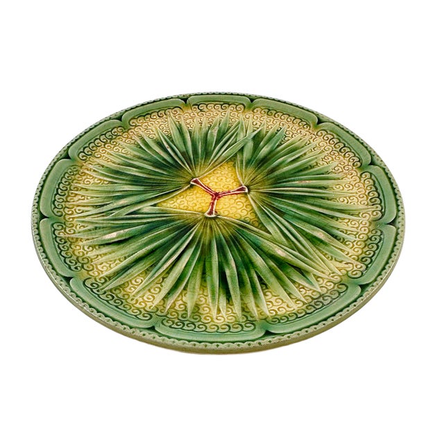 This is a 1880's French Sarreguemines Majolica Plate. This is a charming and rare French antique plate with a fanned palm...