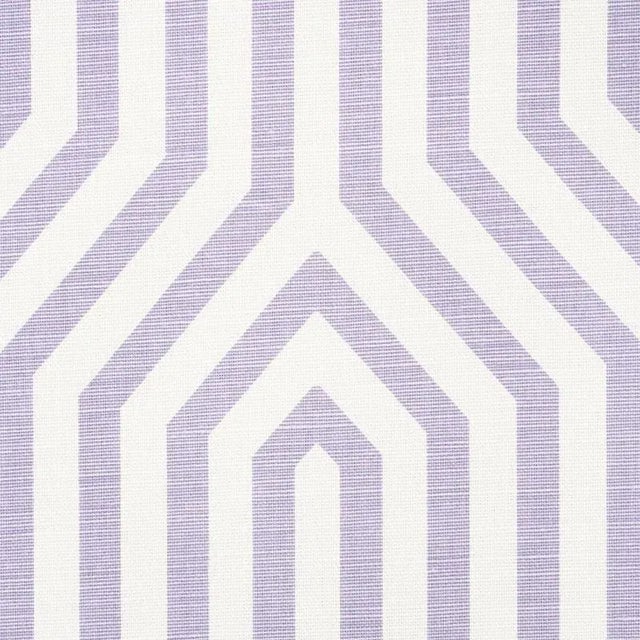 We introduced this large-scale, ziggurat design as a luxe cut velvet. Now, we've translated it into a fun, graphic print...