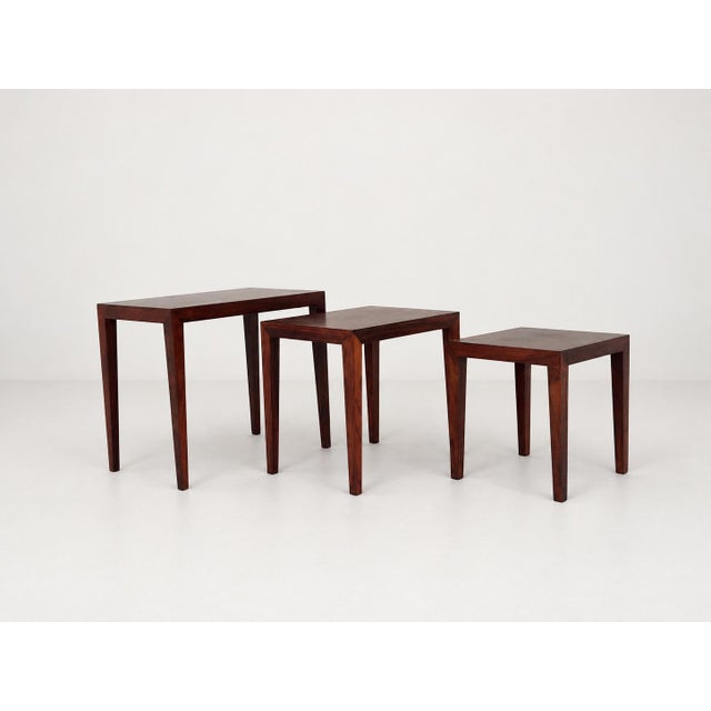 This is a set of three nesting tables produced by the Danish manufacturer Haslev Møbelsnedkeri during the 1960s. The set...