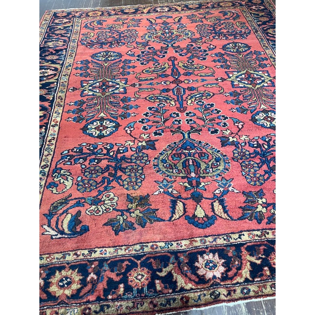This beautiful antique Persian Lilihan rug, woven circa 1920, is a fine example of the distinctive artistry and durable...