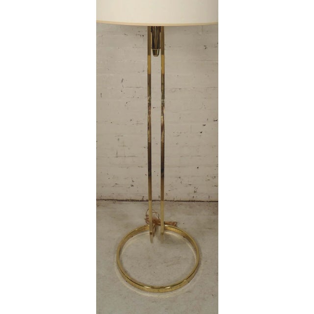 Vintage modern floor lamp with arching base and large shade. Milo Baughman thick brass style design.