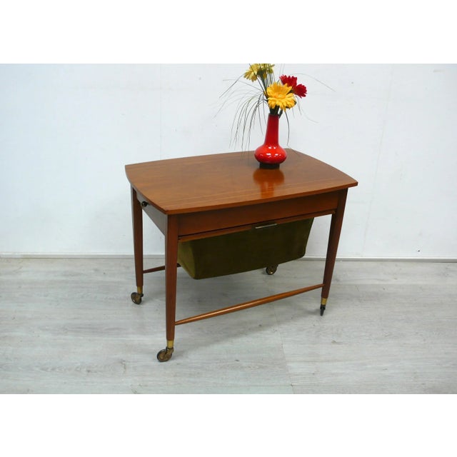 50s 60s sewing table / side table on wheels from ilse möbel no. 3406 with a two-sided drawer and wool pull-out basket, in...