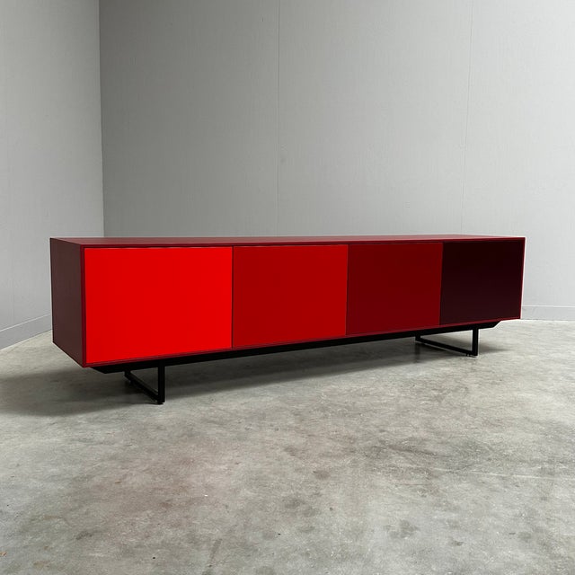 High quality sideboard by the iconic dutch company Pastoe. The Noon derives its unique character from the frame and a...
