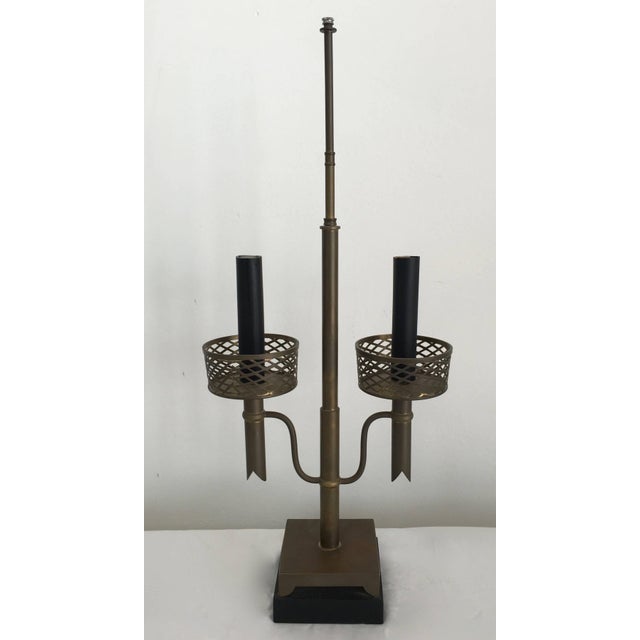 Beautifully designed brass table desk lamp. This lamp looks to be designed by Tommi Parzinger, but cannot verify. The...