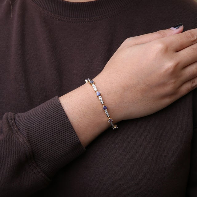 Early 21st Century 14K Yellow 5MM Trillion Cut Blue Tanzanite and 1 1/10 Cttw Diamond Tennis 7" Inches Bracelet (H-I Color, I1-I2 Clarity) For Sale - Image 5 of 6