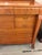 Design Plus Gallery presents a Solid Wood and Veneer Front Dresser with Mirror from the Early 20th Century. The dresser is...