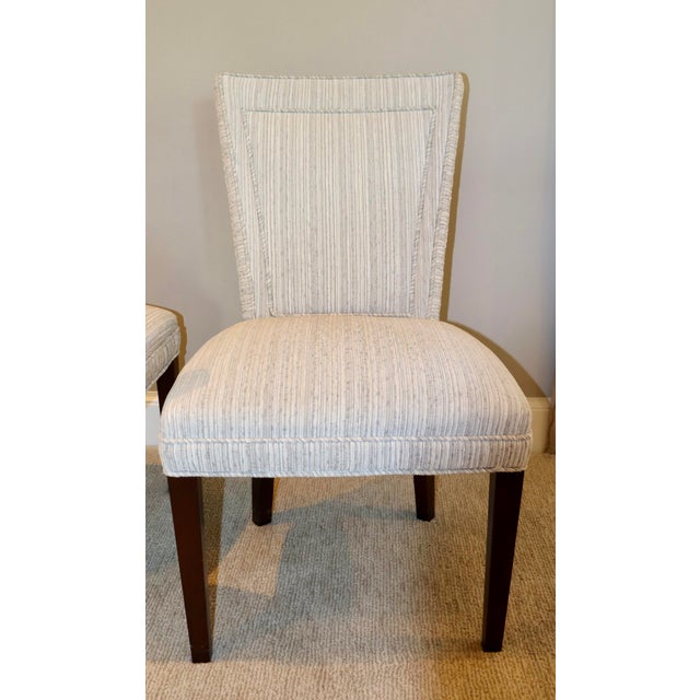 Hickory Chair Dining Chairs. Upholstered in ribbed performance fabric in neutral tones. There are eight chairs in this...