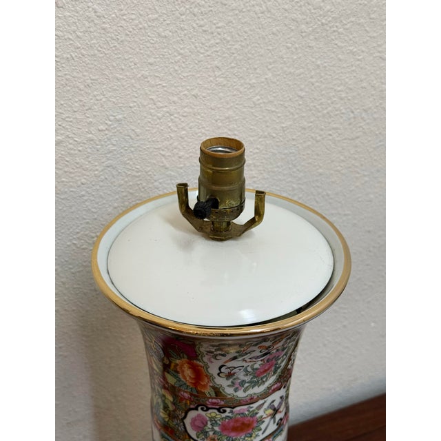 Beautiful pair oriental porcelain style table lamps in excellent vintage condition.