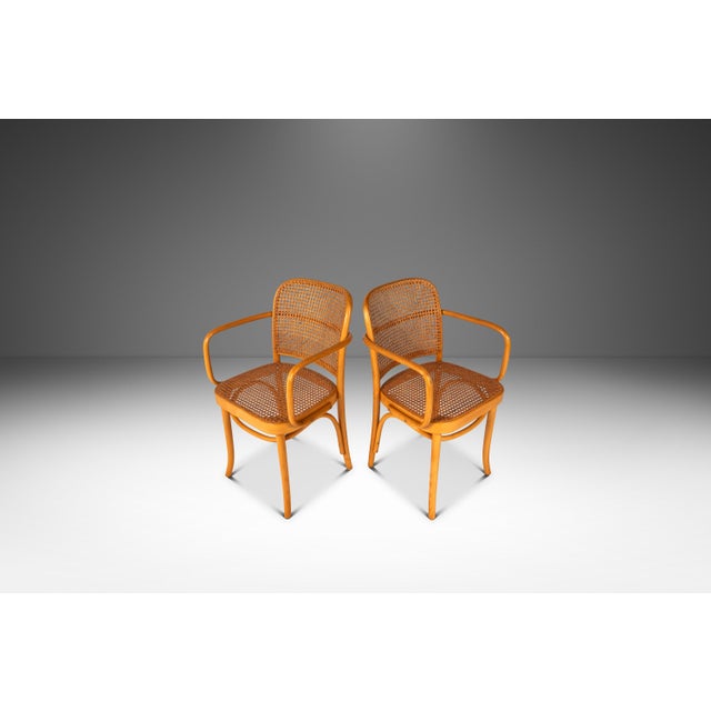 Introducing a rare and limited set of two matching bentwood Model 811 armchairs by the renowned designers Josef Frank and...