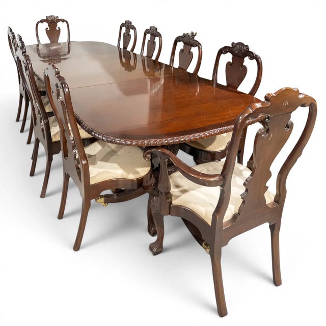 20th Century, USA A vintage Queen Anne style formal dining set comprising of an extendable double-pedestal dining table,...