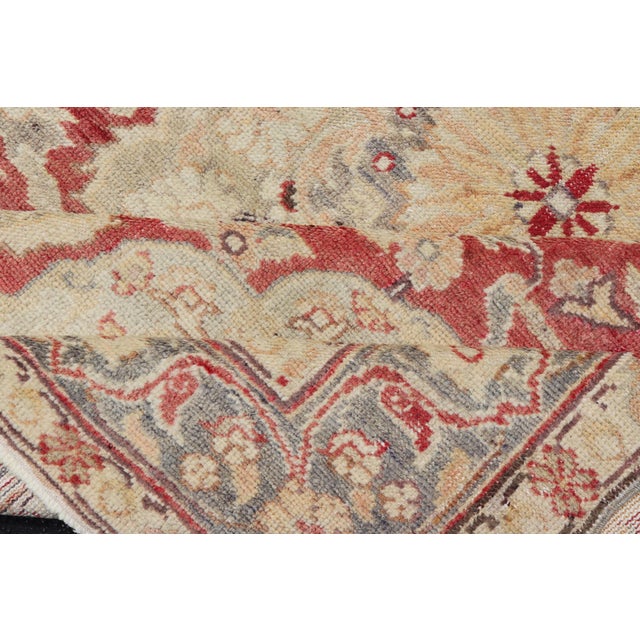 Fine Turkish Oushak Rug With Centre Medallion in Light Red and Ivory For Sale - Image 11 of 12