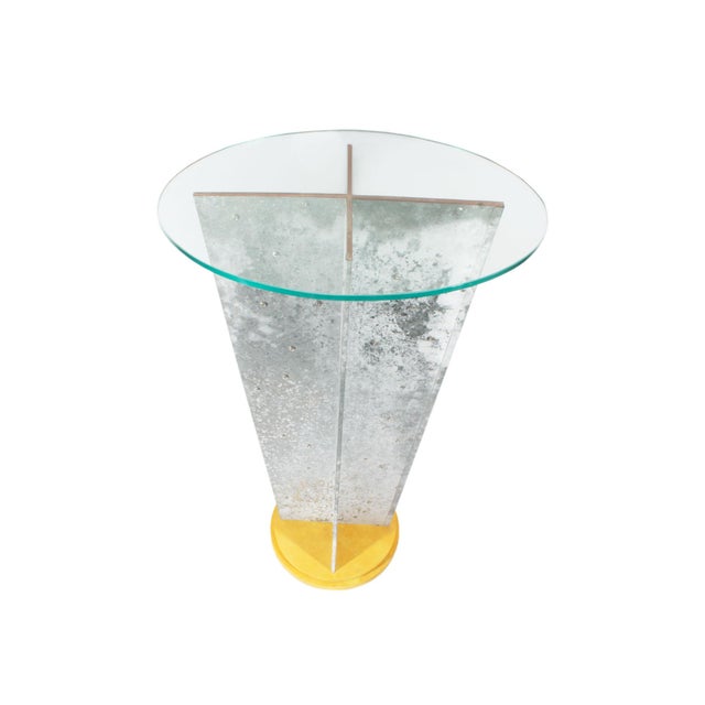 A Postmodern pedestal stand by the American sculptor Georgia Strange. This stand features a tin-wrapped, X-shaped...