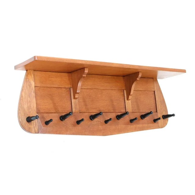Stunning and rare Art Deco Amsterdamse School wall coat rack. Design in the style of Paul Bromberg. Striking Dutch design...