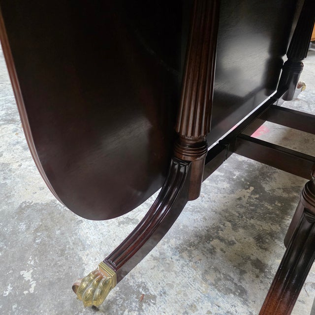 Late 20th Century Baker Furniture Williamsburg Reproduction Mahogany Drop-Leaf Dining Table For Sale - Image 12 of 13