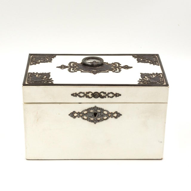 An elegant painted English Victorian Period tea caddy with elaborate metalwork circa 1890, interior with two lids and...