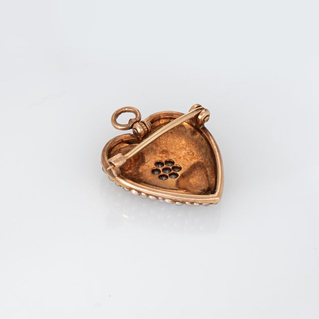 Finely detailed antique Victorian Krementz pearl & diamond heart pendant/brooch crafted in 14 karat rose gold (circa 1880s...