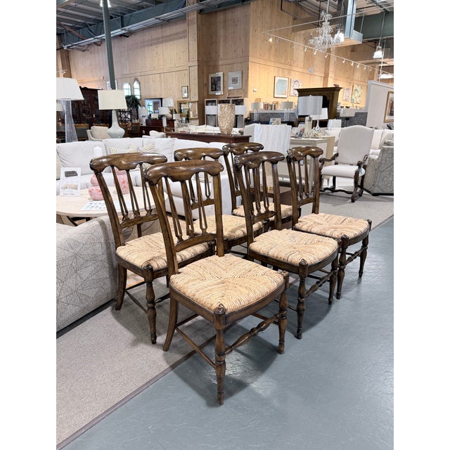 An exceptional set of six Maitland-Smith Wellington Cottage dining chairs showcasing the brand’s signature interpretation...