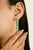 Make an unforgettable statement with these luxurious 14K Yellow Gold Emerald and Diamond Halo Dangle Earrings. Each...