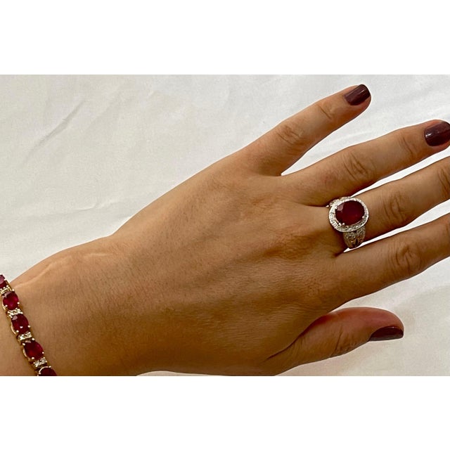 Oval 7.5 Carat Treated Ruby and 1 Carat Diamond 14 Karat Yellow Gold Ring For Sale - Image 14 of 18