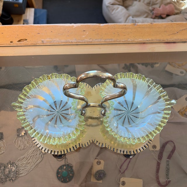 2 Gorgeous swirled and ribbed Vaseline glass heart shaped dishes in silver plated holder