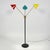 A wonderful example of Italian midcentury lighting, this three-arm floor lamp has conical-shades in red, yellow and blue...