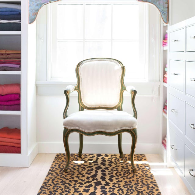 Take a walk on the wild side! Our animal pattern hooked wool area rug looks fierce in spaces small and large. Vacuum...