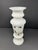 An antique milk glass pedestal vase, 14 inches in height, featuring a refined baluster form and hand-painted silver...