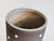 A handcrafted and signed vase by Johannes Andreas Urban, finished with a matte, translucent anthracite glaze that lends...