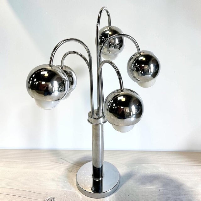 Stunning 1970s atomic style chrome waterfall table lamp, in the style of Robert Sonneman. This lamp will be a focal point...