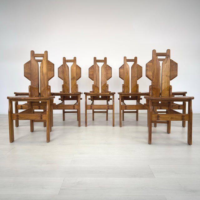 Dimensions: H 39.5” x W 17.3” x D 20” x SH 18.7” Set of 7 Vintage Italian Brutalist Sculptural dining chairs from the...