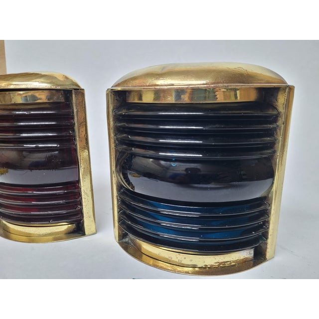 Highly polished solid brass boat lanterns with fresnel glass lenses. Rich blue and red in color. Circa 1950 Weight: 2 lbs...