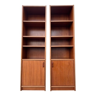 A Pair of Vintage Single-Column Danish Teak Bookcases With Cabinet Storage. Circa 1970s For Sale
