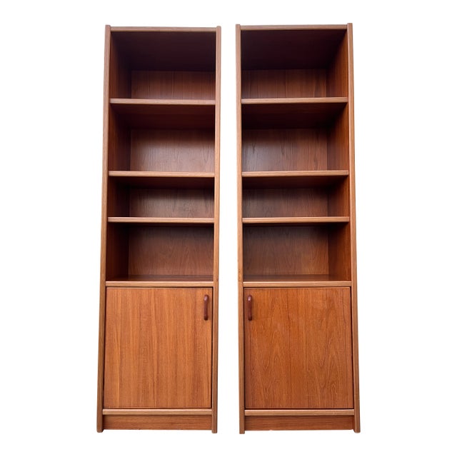 A Pair of Vintage Single-Column Danish Teak Bookcases With Cabinet Storage. Circa 1970s For Sale